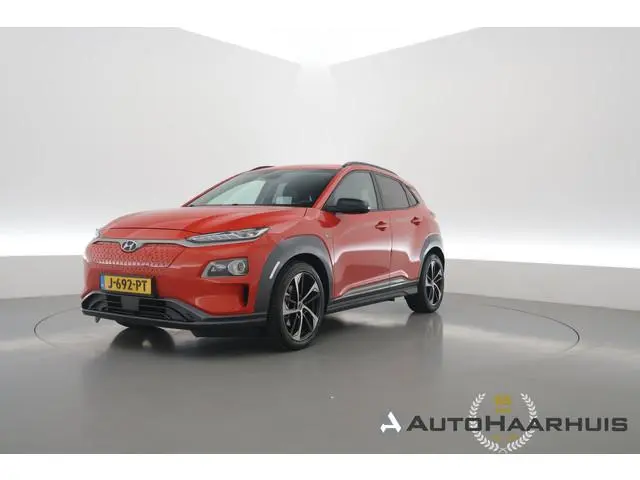 Hyundai Kona EV Premium 64 kWh | Rijklaar ! |SOH 96.6% | Warmtepomp | HUD | Krell | Adapt. Cruise |...