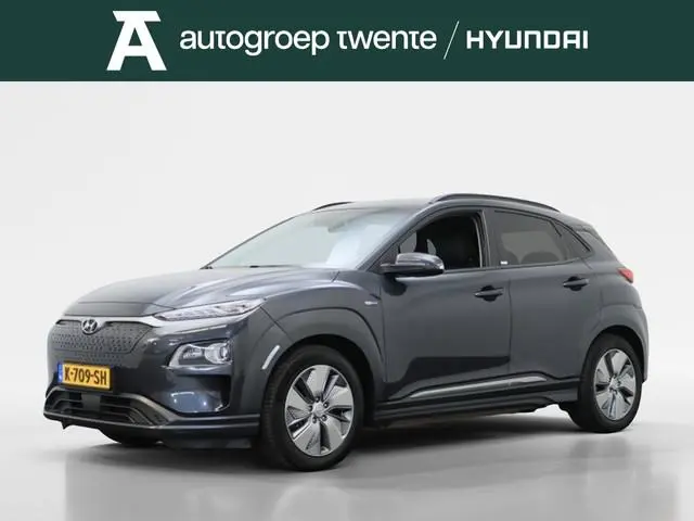 Hyundai Kona EV Premium 64 kWh | Afn. Fietsendragerhaak | Stoelverwarming | Navigatie |