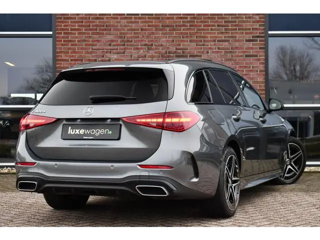 Mercedes-Benz C-klasse Estate 300 e AMG Line Pano Trekh Distronic Night 360-cam