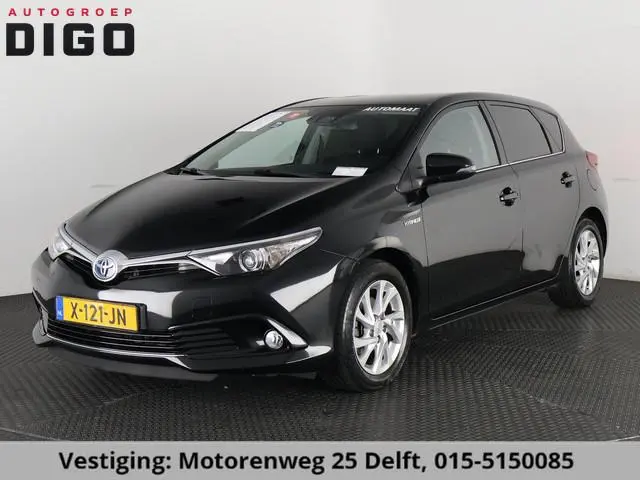Toyota Auris 1.8 HYBRIDE EXECUTIVE AUTOMAAT GARANTIE 2029! CAMERA.STOELVERWARMING . NAVIGATIE . CRUI...