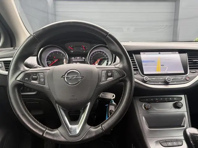 Opel Astra Sports Tourer 1.0 Online Edition ✓2e Eigenaar✓Carplay✓Navi✓Trekhaak✓Net beurt gehad✓Clima...