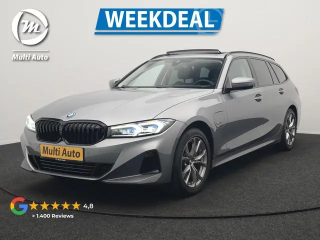 BMW 3-serie Touring 320e Sportline FACELIFT PHEV Dealer O.H | Panodak | Widescreen Navi | Harman Kar...