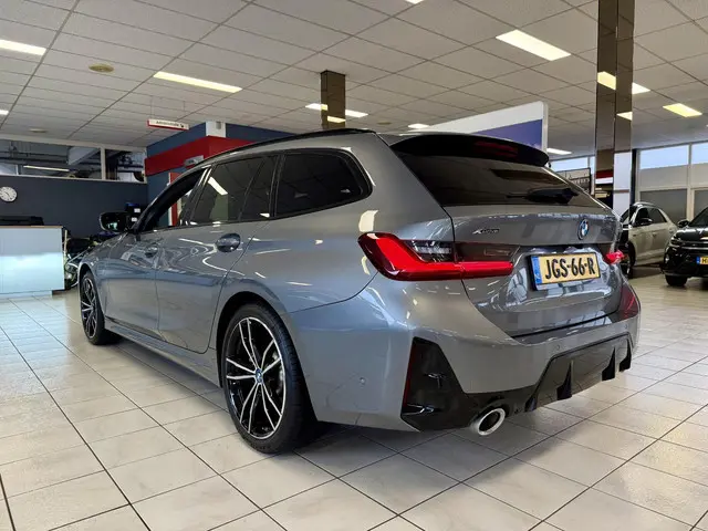 BMW 3-serie Touring 330e xDrive *PANO*H&K*360CAM*LEER*HUD*VOL*