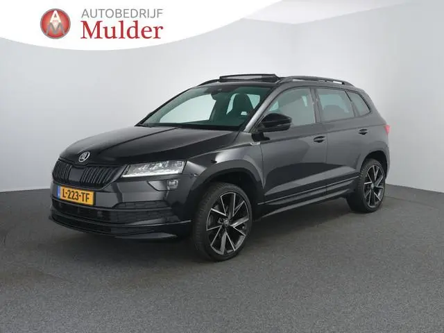 Skoda Karoq 1.5 TSI ACT Sportline Business | Pano | Zwenkhaak | Winterpakket | Camera | ACC |