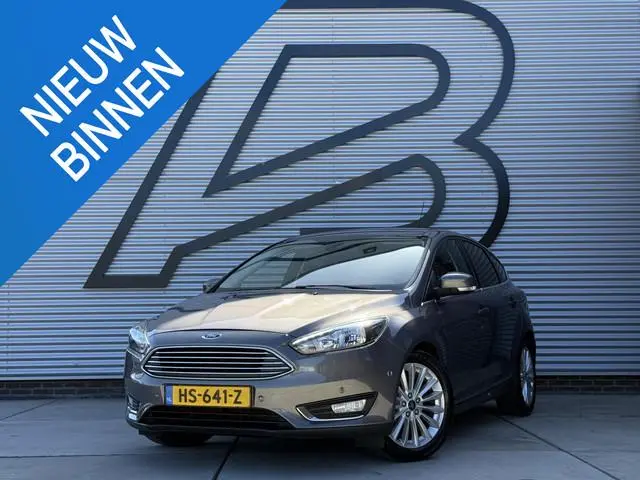 Ford Focus 1.0 Titanium Edition 2e Eigenaar|Navi|Clima|Cruise|PDC V+A|LM Velgen|N.A.P|APK tot 05-202...