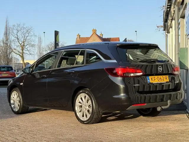 Opel Astra Sports Tourer. 1.0 Business+ | TREKHAAK | PDC V/A | CARPLAY | NAVI | CRUISE |