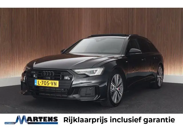 Audi A6 Avant 55 TFSIe 367pk quattro Competition Luchtvering HUD Trekhaak Keyless Stoelverwarming Pa...