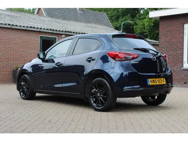 Mazda 2 1.5 SkyActiv-G 90 Homura -  Stoel- stuurverwarming, Cruise, Achteruitrijcamera, Airco!