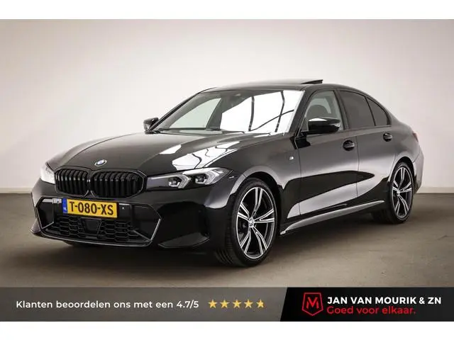 BMW 3-serie 318i M-Sport | TRAVEL- PACK | KANTELDAK | STOELVERWARMING | DAB | APPLE | 19"