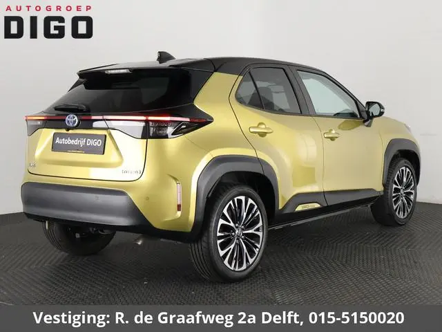 Toyota Yaris Cross 1.5 Hybrid Executive Bi-Tone | Panoramadak | Dodehoek Detectie | HUD | Navigatie