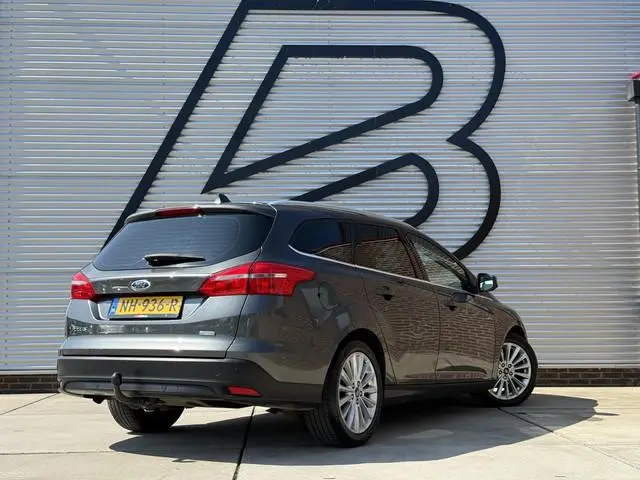 Ford Focus Wagon 1.0 Titanium Carplay|Trekhaak|Clima|Cruise|PDC V+A|Navi|Elek ramen|N.A.P|Nieuwe APK...