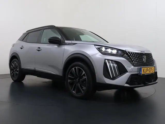 Peugeot e-2008 GT VAN: 28.900,- VOOR: 25.440,- UW WKVOORDEEL: 3.460,- | WARMTEPOMP| SOH 96% | ACHTER...