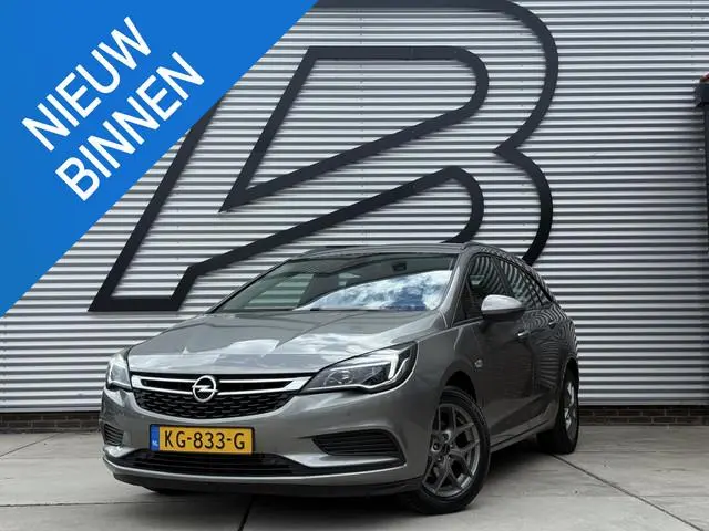 Opel Astra Sports Tourer 1.4 Business+ 1e Eigenaar|Navi|Cruise|Trekhaak|Carplay|PDC V+A|Airco|Goed o...