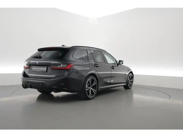 BMW 3-serie Touring 320e M Sport | SOH 90.7% | Facelift | Shadow Line | Curved display | Adapt. Crui...