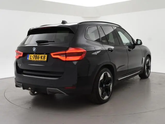 BMW iX3 HIGH EXECUTIVE 80 kWh + TREKHAAK | PANORAMA | 360 CAMERA | ADAPTIVE CRUISE | SFEERVERLICHTIN...