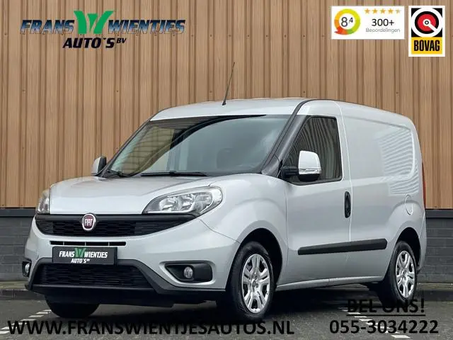 Fiat Doblò 1.3 MJ L1 | Marge! | Trekhaak | Navigatie | Airconditioning | Cruise Control | Bluetooth...