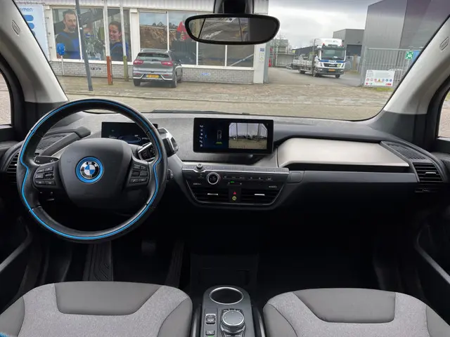 BMW i3 S 184pk Executive 120Ah 42 kWh*Melbourne Red*Adaptive/W-pomp/Camera/3-fase/20"