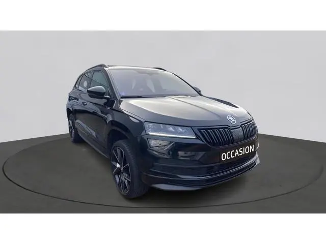 ŠKODA Karoq 1.5 TSI ACT 150pk DSG Sportline Business Panorama Trekhaak Camera Stoelverwarming Carpla...