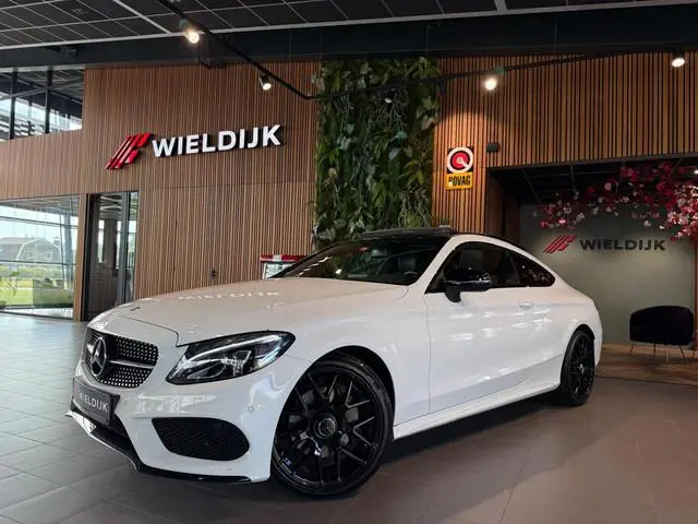 Mercedes-Benz C-klasse Coupé 180 Premium Plus Panorama Schuifdak nieuwe velgen en banden