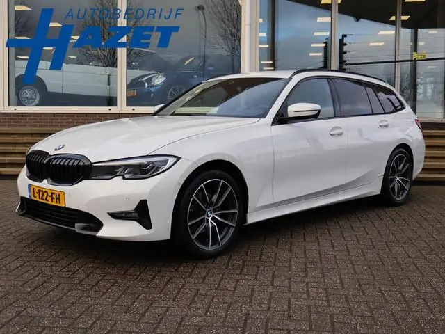 BMW 3-serie Touring 320d HIGH EXECUTIVE SPORTLINE 190 PK AUT. *ALPINWEISS* + ELEK. TREKHAAK | LASER...