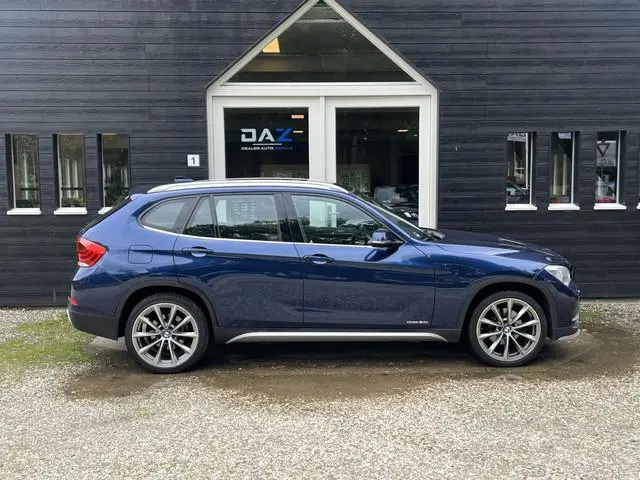 BMW X1 sDrive20i High Executive Aut/Ecc/Leer/Navi/Pano