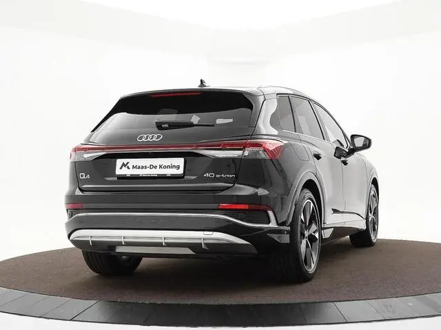 Audi Q4 e-tron 40 S edition 77 kWh · SOH 97,4% · Panoramadak · Camera · Head-Up Display · Stoelverwa...