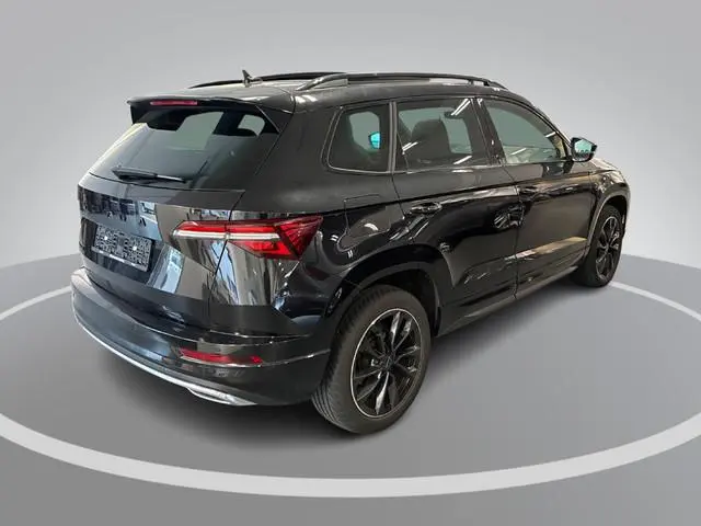 Skoda Karoq 1.5 TSI 150pk DSG ACT Sportline Business · Panoramadak · Camera · Keyless · Matrix LED ·...