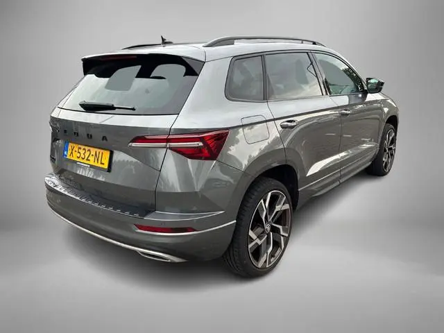 Skoda Karoq 1.5TSI/150PK DSG ACT Sportline Business · Panoramadak · Trekhaak · Apple/Android Car pla...