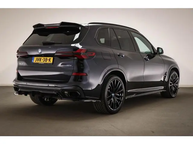 BMW X5 xDrive50e | PANORAMADAK | ACHTERBANKVERWARMING | INDIVIDUAL VOLLEDER MERINO | HEAD UP | 360 C...