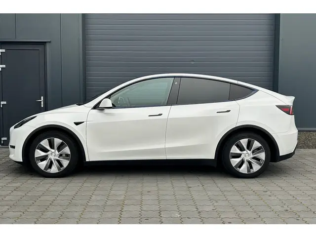 Tesla Model Y Long Range AWD 75 kWh TREKHAAK PANO LEER 1e eig.!