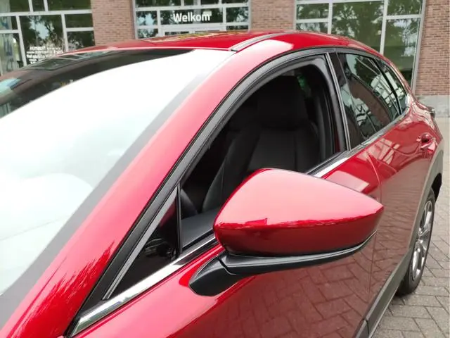 Mazda CX-30 2.0 e-SkyActiv-X M Hybrid Luxury Afn.trekhaak - Leder - Head-up display - Adaptive Cr.co...