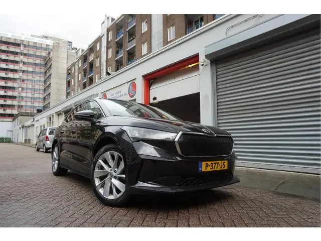 ŠKODA Enyaq iV 60 | NL Auto | 1ste eigenaar | Trekhaak |  Adaptive+Lane | Sfeer | 20inch | Leer/ sto...