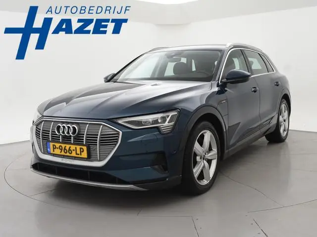 Audi e-tron 55 QUATTRO 95 kWh + TREKHAAK | NACHTZICHT 92% SOH| LUCHTVERING | HEAD-UP | ADAPTIVE CRUI...