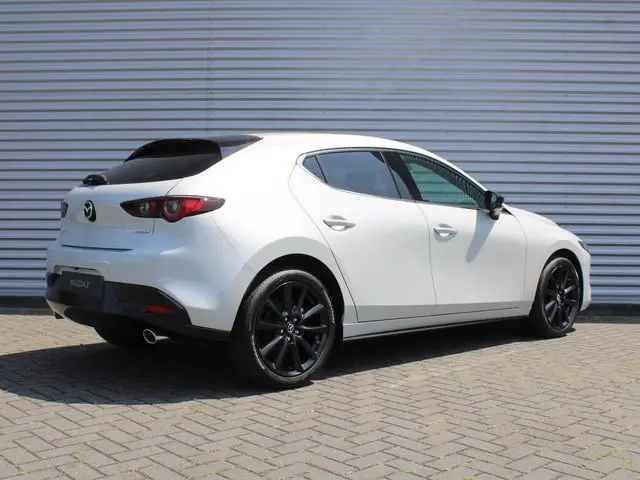 Mazda 3 2.0 e-SkyActiv-G M Hybrid 150 Homura | Stoelverwarming | Camera | Dodehoek detectie | HUD |...