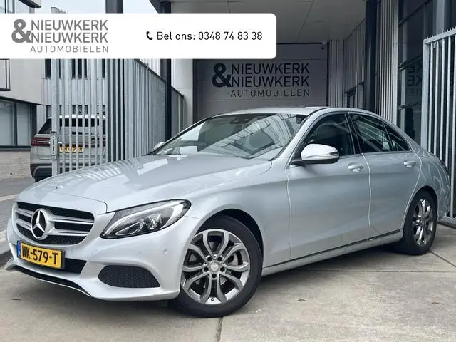 Mercedes-Benz C-klasse 180 Prestige | AUTOMAAT | SCHUIF/KANTELDAK | CAMERA | NAVI | CRUISE CONTROL |...