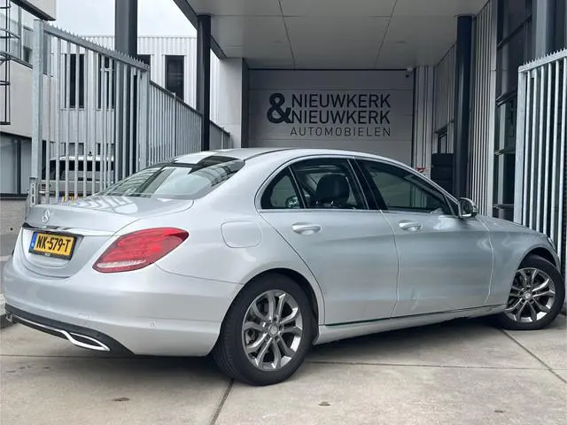 Mercedes-Benz C-klasse 180 Prestige | AUTOMAAT | SCHUIF/KANTELDAK | CAMERA | NAVI | CRUISE CONTROL |...