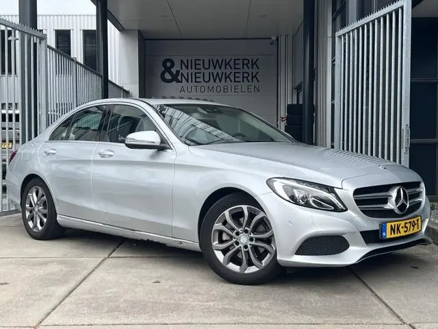 Mercedes-Benz C-klasse 180 Prestige | AUTOMAAT | SCHUIF/KANTELDAK | CAMERA | NAVI | CRUISE CONTROL |...