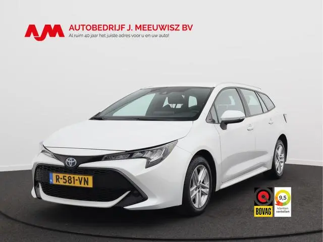 Toyota Corolla Touring Sports 1.8 Hybrid Active/ lage km/ wit metallic! zeer mooi!
