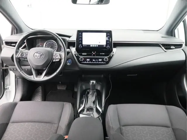 Toyota Corolla Touring Sports 1.8 Hybrid Active/ lage km/ wit metallic! zeer mooi!