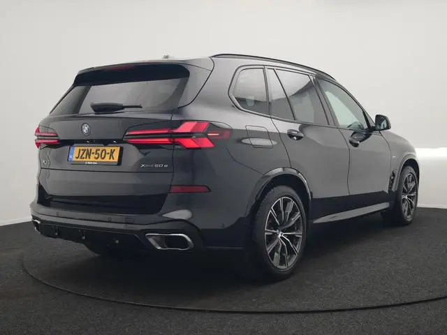 BMW X5 xDrive50e M Sport PHEV 490pk Dealer O.H. | Panodak | Luchtvering | Adaptive Cruise | Head Up...