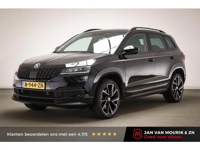 Skoda Karoq 1.5 TSI ACT Sportline Business | STOEL / STUUR- VERWARMING | DAB | APPLE | CAMERA | TREK...