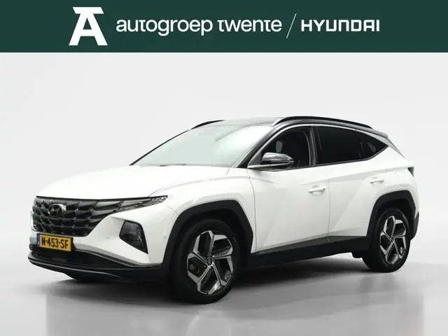 Hyundai Tucson 1.6 T-GDI HEV Premium | Trekhaak | Leder | Stoelventilatie | 360 Camera | Apple carpl...